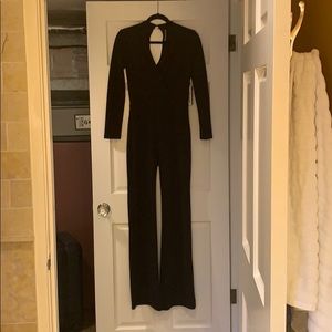 Yolanda baraschi black long sleeve jump suit